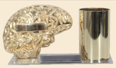 metal table top golden brain with golden glass